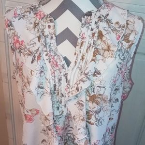 Sleeveless floral ruffle blouse